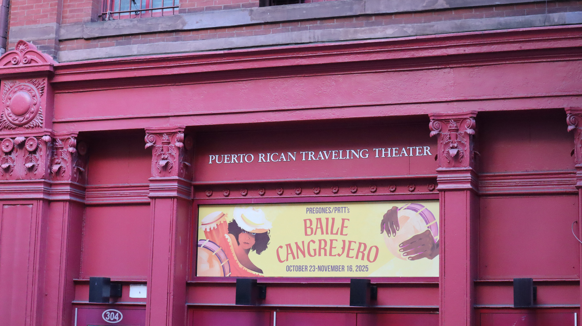 Print Design for the Baile Cangrejero production displayed on the upper theater window at Pregones/PRTT.